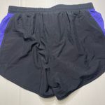 Under Armour Women  Heat Gear Black Purple 2 in 1 Shorts Pockets Drawstring Sz S Photo 4