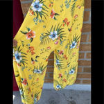 Likely  yellow floral jumpsuit size 10 Photo 5