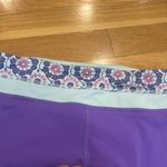 Lululemon Athletica Purple Leggings with Floral Trim Photo 1