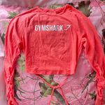 Gymshark coral pink long sleeve logo crop top Photo 1