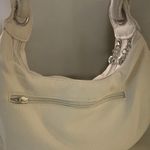 Chic White Crescent Shoulder Bag with Metal Hardware Photo 1