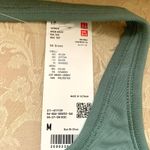 Uniqlo Open Back Halter Bra Top in Green Photo 4
