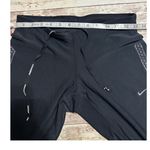 Nike  Dri-Fit Running Leggings Women's Size Medium Black Zip Legs Athleisure Photo 6
