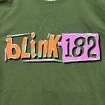 Blink-182 green crewneck sweater in size Medium Photo 1