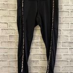 Buc-ee's Women’s Buc-ee’s black with cheetah animal print accent leggings Large Photo 0