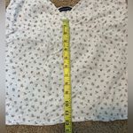 Brandy Melville Floral White Spaghetti Strap Top Photo 7