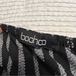 Boohoo jumpsuit cutouts black white stripe size 10 Photo 8