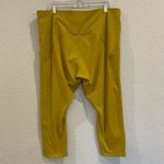 Athleta Ultimate Stash Pocket 7/8 Tight in Oxidized Yellow (Mustard) Photo 3
