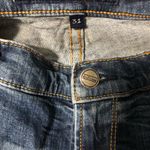 Driftwood floral embroidered distressed jeans women’s size 31 measures 34 x 29” Photo 1