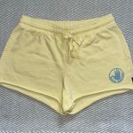 Body Glove Womens Pastel Yellow  Raw Hem Sweat Shorts Sz Xs Blue Logo Photo 0