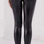 Black faux leather leggings Size M Photo 1