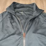 Apana  women’s green zip front warm up jacket with rose gold zipper, sheer arms Photo 1