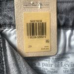 Levi's woman's Black Jean Shorts High-Waisted Raw size 29” Photo 5