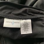 Jaclyn Smith Elegant Black Halter Swimsuit Photo 6