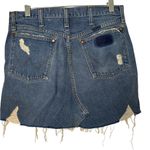 Furst of a Kind  Distressed Denim Skirt with Unique Side Straps Photo 1