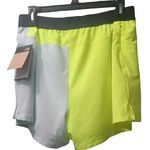 The North Face Women's Size XXL Flash Dry Short Gray Yellow Color Block Photo 1