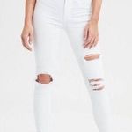 American Eagle Outfitters white ripped hi-rise jeggings Photo 0