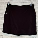 Athleta Black Mini Skort size 16 multiple pockets slit in back Photo 0