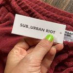 SUB_URBAN RIOT Red Sweats Photo 4