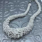 Boutique Boho white layered ruffed seed bead statement necklace. Photo 1
