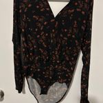 BCBGeneration  Black and Orange Floral Bodysuit Photo 0