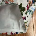 Loft Ann Taylor  pencil skirt. Size 2 White floral butterfly skirt with zipper. Photo 4