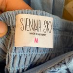 Sienna Sky Light Blue Buttoned Crop Top Photo 1