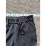 Lululemon Women's On the Fly Woven Pants Ankle Black Size 4 Photo 5