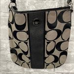 Coach Signature Logo Stripe
Swingpack Crossbody Leather Trim
Black Tan Bag Photo 0