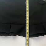 CeCe  Elegant Black Garment Photo 6