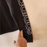 Adidas  black full zip cropped jacket size womens medium Photo 2