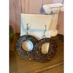 Wooden round center cutout dangle earrings Brown Photo 3