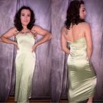 Elegant Green Satin Dress with Floral Accents Photo 0