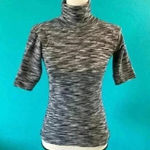 Free People  stretchy turtleneck shirt in size small Photo 0