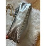 Victoria's Secret Victoria secret silver crossbody purse w gold chain and tassel Photo 4
