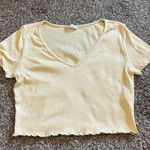 Altar'd State yellow Ribbed cropped V-Neck Tee Photo 0