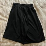 Small Black Green School Basketball Shorts Photo 1