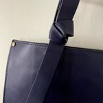 A New Day navy blue spacious shoulder handbag zipper inner pocket clasp bow Photo 1