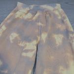 Pretty Little Thing tie dye sweatpants loungewear in yellow and brown size 2. Photo 7