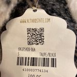 Altar'd State Very cute, oversized, shacket. Perfect to pair with a dress and thigh high boots Photo 15