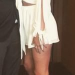Reverse White Cutout Romper Photo 1