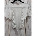 Free People  White Ribbed Knit Short Sleeve Bodysuit Snap Closure Cutout Sides Photo 7