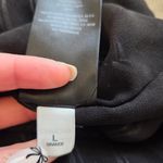 Bebe Black and White Striped Sleeveless Bodysuit Photo 14