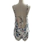 Talula  Women Size Small White Romper Floral Open Back (33-447) Photo 1