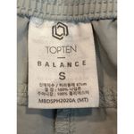 Top Ten Balance Movement Shorts Soft Gray Color Small Cargo Pocket Elastic Waist Photo 3