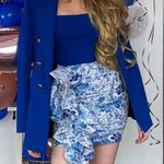 House Of CB marielle BLUE + WHITE PRINT RUFFLE MINI SKIRT. Size large Photo 1