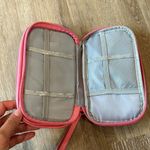 NWOT pink makeup travel bag. Perfect for packing jewelry as well Photo 1