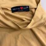 2X Absolutely ❤️It simply simple long dress. Nice color no flaws easy fit Gold Photo 3