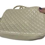 Vintage Quilted Beige Leather Shoulder Bag With Gold Chain & Tassel Accent Photo 0