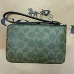 Coach Corner Zip Wristlet In Signature Canvas caq75 Photo 1